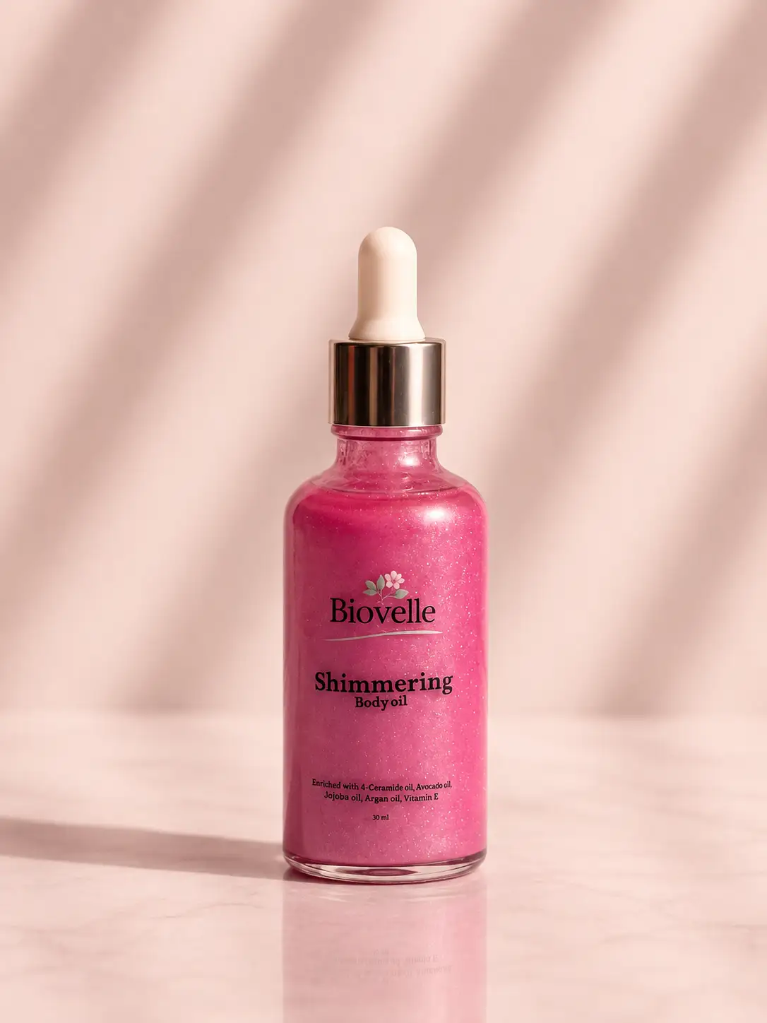 Shimmering dry body oil pink